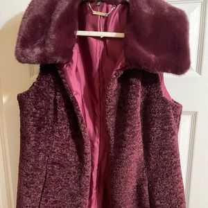 selling this white and black brand vest I want to sell it FAST make me an offer